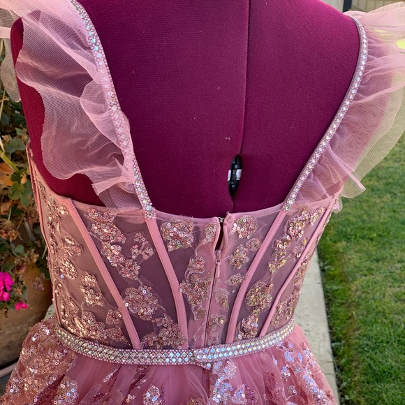 Glitter Mesh Corset Tiered Ballgown with Sequin and Ruffle Detail.
Prom dress. - Picture 9 of 17